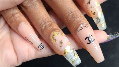 gold chanel nails.